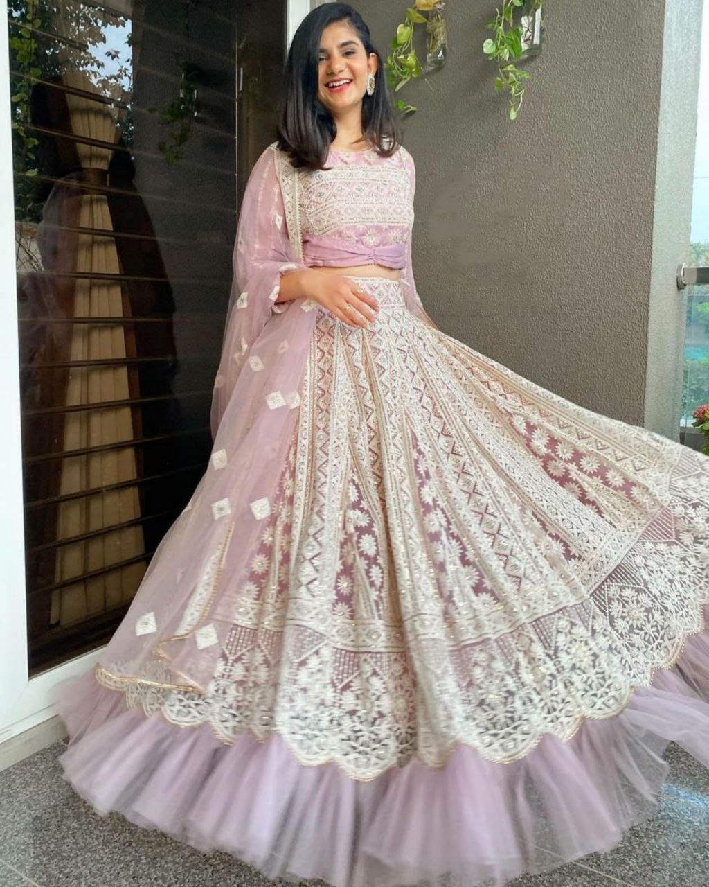 Designer Mauve Net Embroidery Work Lehenga Choli With Dupatta