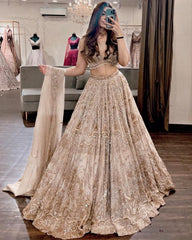 Designer Cream Soft Net Embroidery Work Lehenga Choli With Dupatta